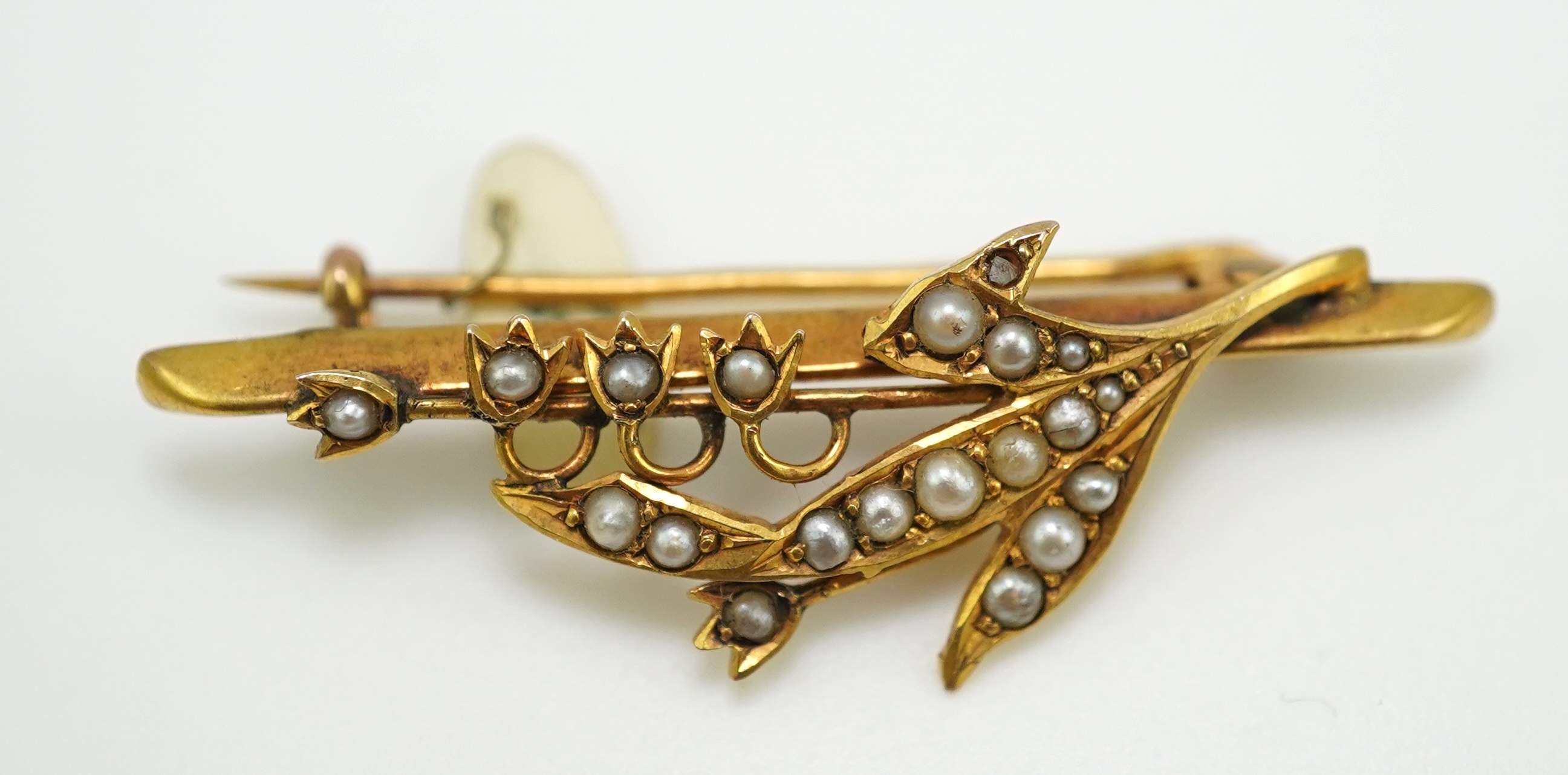 A collection of three late Victorian/Edwardian seed pearl brooches, circa 1900